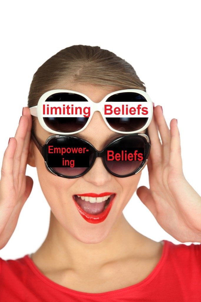 Studio shot of a woman wearing two pairs of sunglasses